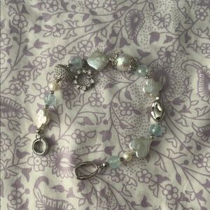 Elegant Silver and Pearl Charm Bracelet
